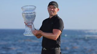 Matt Wallace of England poses with the trophy after winning the Corales Puntacana Championship at Puntacana Resort & Club, Corales Golf Course on March 26, 2023