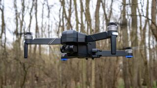 Ruko F11GIM2 Drone - drone in flight (16 by 9 format).