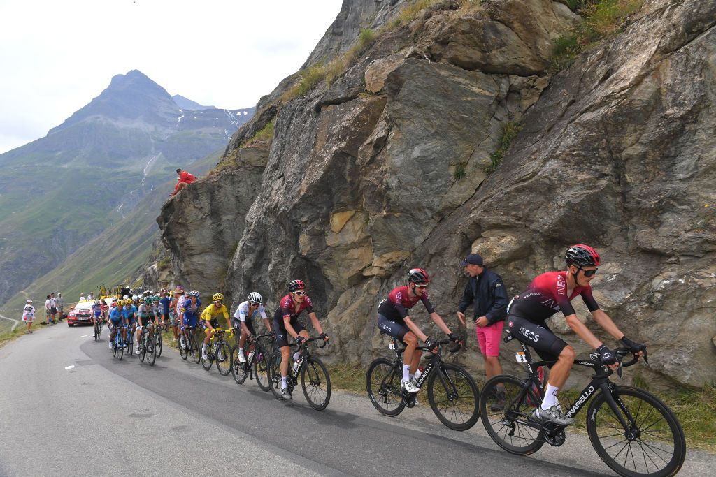 Team Ineos lead the peloton on the Iseran