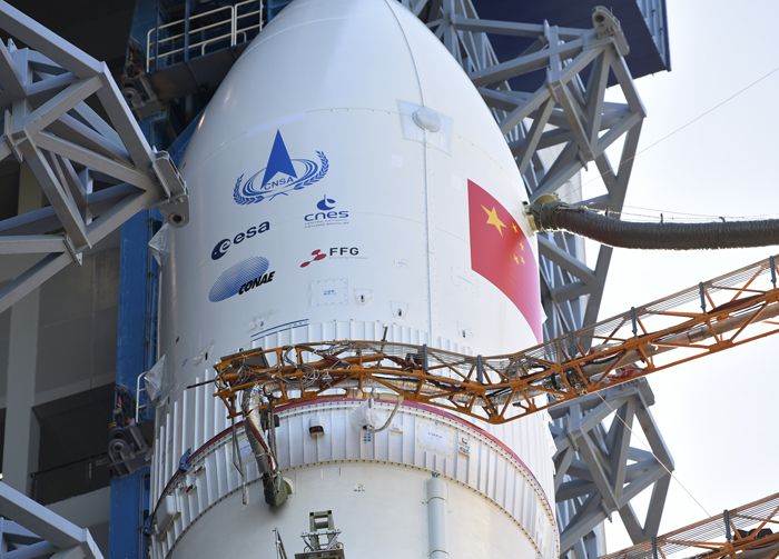 The Long March-5 rocket for China&#039;s Tianwen-1 Mars mission was transported to the launch area at China’s Wenchang Space Launch Center on July 17, 2020. Note the logos of the European (ESA), French (CNES), Argentine (CONAE) and Austrian (FFG) space agencies in addition to that of the China National Space Agency (CNSA).