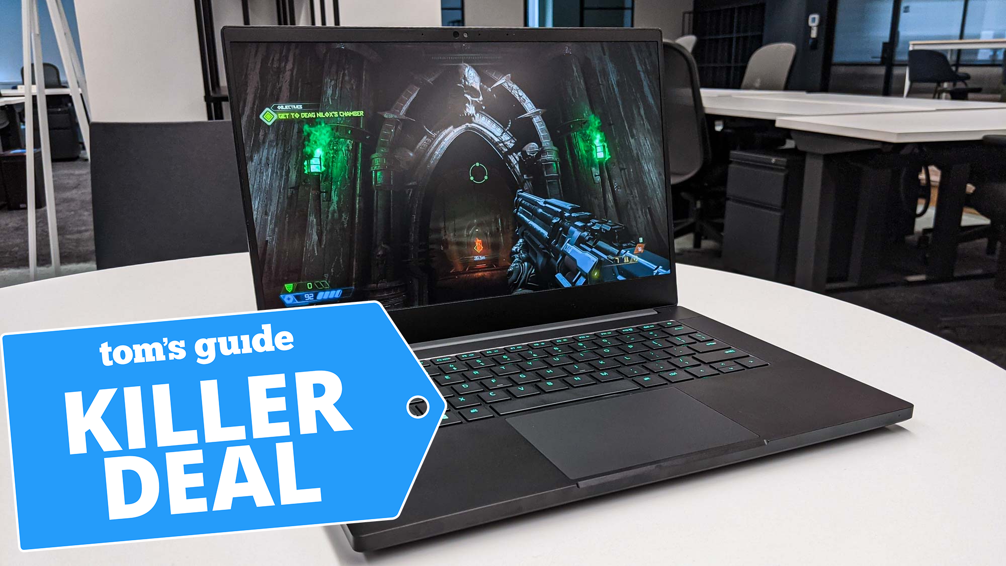 Razer Blade 14 with deal tag overlaid