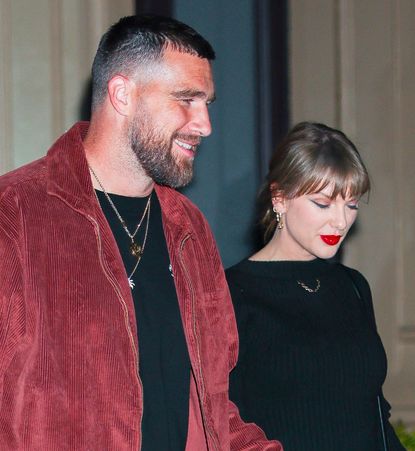 Taylor Swift in a black outfit and Travis Kelce in a red jacket and black T-shirt in NoHo on November 06, 2025 in New York City
