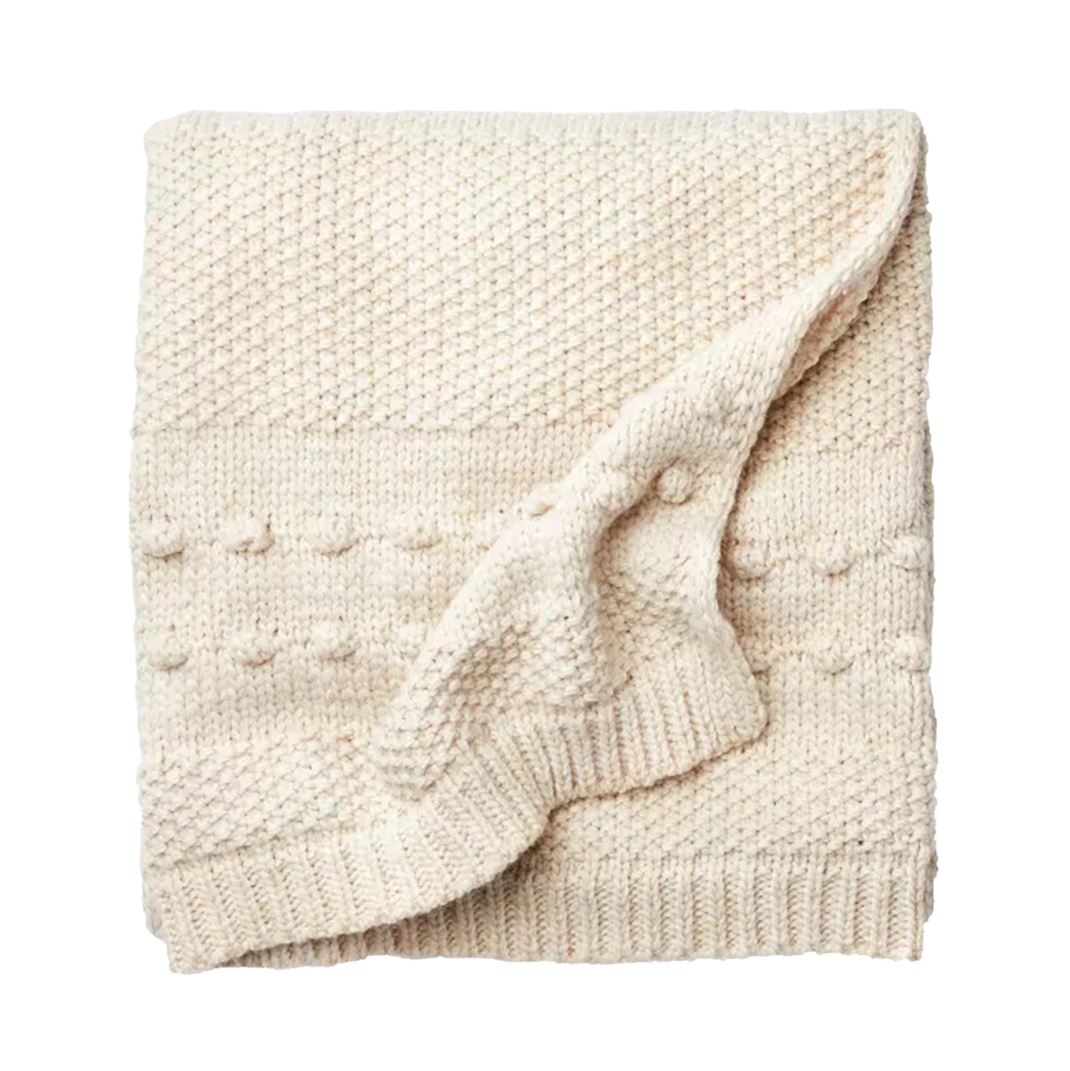 A cream bobble knit throw blanket folded up
