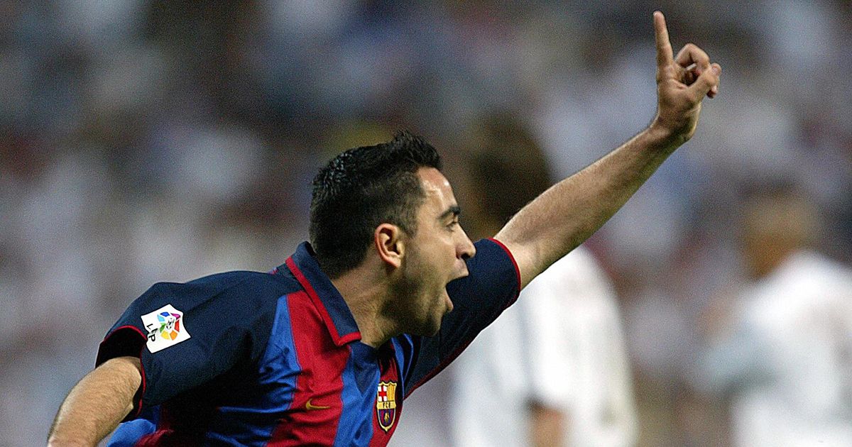 Barcelona&#039;s Xavi celebrates his goal during a Spanish first league football match between Real Mardrid and FC Barcelona at Santiago Bernabeu stadium in Madrid 25 April 2004.