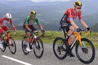 Fred Wright paces Bahrain Victorious teammate Sonny Colbrelli on a climb during stage 16