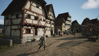 Manor Lords tips - Peasants walking through town