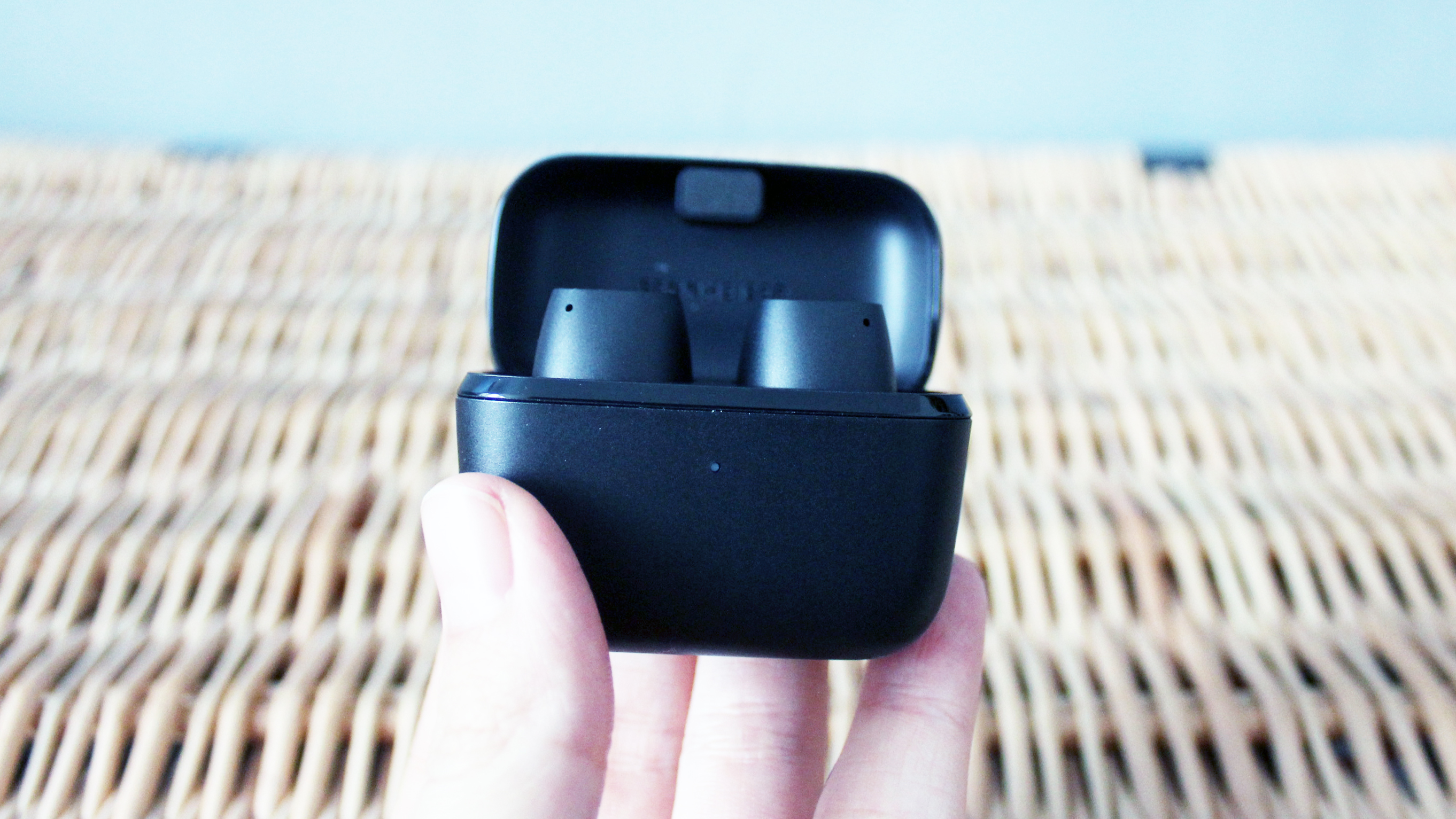 the sennheiser cx true wireless earbuds in their charging case