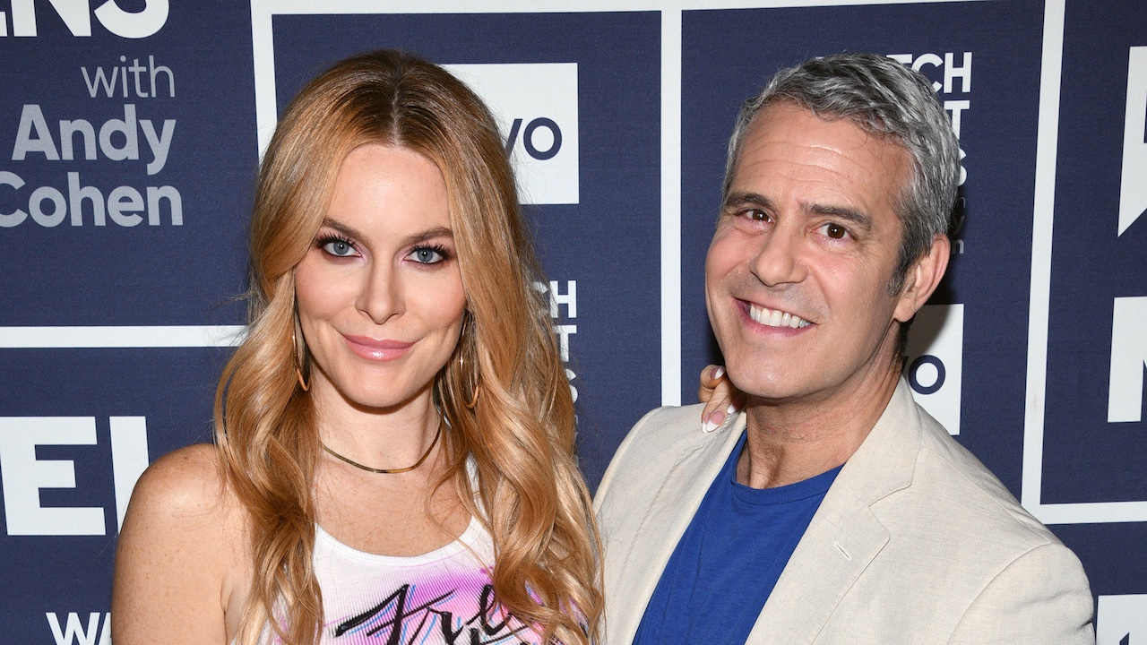 Leah McSweeney and Andy Cohen posing at Watch What Happens Live!.