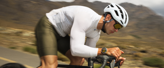 Promotional image of the HUAWEI WATCH GT6 on a cyclist speeding along a road