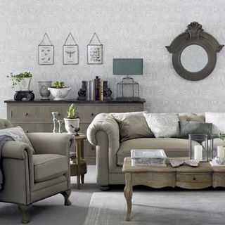 grey living room with armchair and coffee table