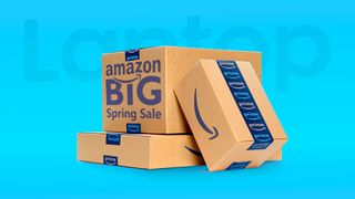 Image of Amazon Prime delivery boxes with the words 'Amazon BIG Spring Sale' printed on one side, the Laptop Mag logo is faintly present in the blue background.