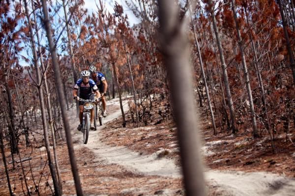 Mark Eltringham and Gavin Shnier make their way through the burned mountain side just outide Caledon