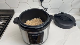 Crock-Pot Express full of rice on a kitchen countertop