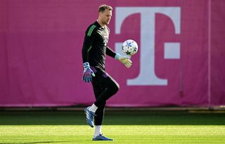 Bayern Munich's German goalkeeper #01 Manuel Neuer warms up during a training session at the team's training ground in Munich, southern Germany, on October 23, 2023, on the eve of the UEFA Champions League Group A football match between Galatasaray Istanbul and Bayern Munich. Bayern Munich coach Thomas Tuchel said the side would "not rush anything" as captain Manuel Neuer edged closer to a return from injury after almost 12 months on the sidelines. (Photo by Christof STACHE / AFP) (Photo by CHRISTOF STACHE/AFP via Getty Images)