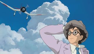 The Wind Rises Jiro looks up at an airplane