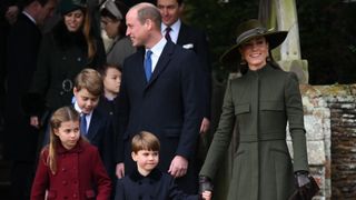 Princess Charlotte, Prince George, Prince William, Prince Louis and Catherine, Princess of Wales leave at the end of the Royal Family's traditional Christmas Day service in 2022