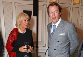 LONDON, ENGLAND - OCTOBER 18: Camilla, Duchess of Cornwall, and son Tom Parker Bowles attend the launch of "Fortnum & Mason: The Cook Book" by Tom Parker Bowles at Fortnum & Mason on October 18, 2016 in London, England. (Photo by David M. Benett/Dave Benett/Getty Images for Fortnum and Mason)