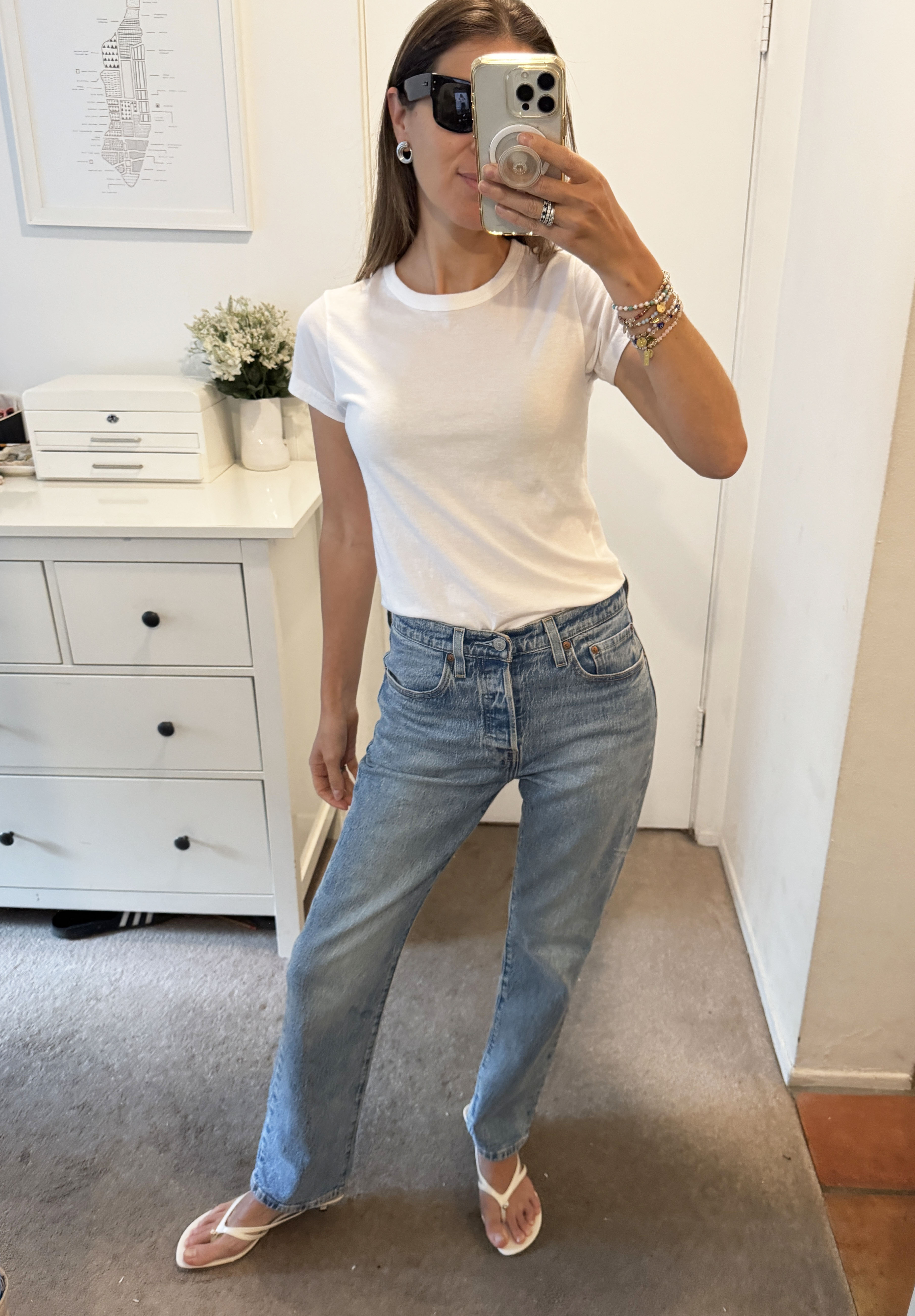 Judith Jones wearing a Buck Mason white tee and Levi 501's.