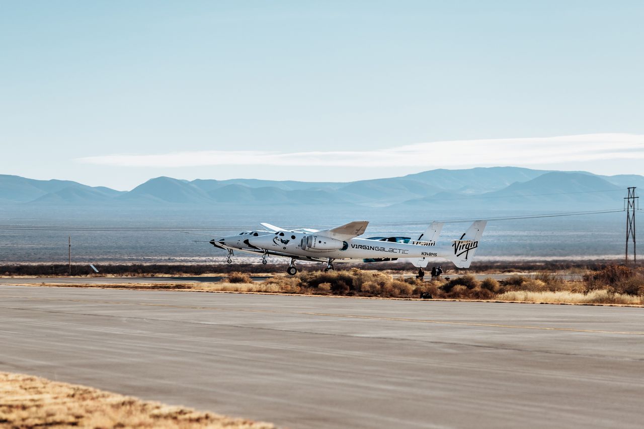 Virgin Galactic's VSS Unity space plane lifts off from Spaceport America in New Mexico beneath the wings of its carrier aircraft, VMS Eve, on Dec. 12, 2020.