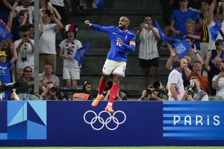 Alexandre Lacazette #10 of France celebrates scoring during the second half of the Men's group A match between France and United States during the Olympic Games Paris 2024 at Stade de Marseille on July 24, 2024 in Marseille, France. (Photo by Brad Smith/ISI/Getty Images)