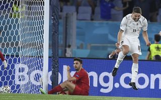 Turkey defender Merih Demiral, left, scored an unfortunate own goal, to the delight of Italy forward Domenico Berardi