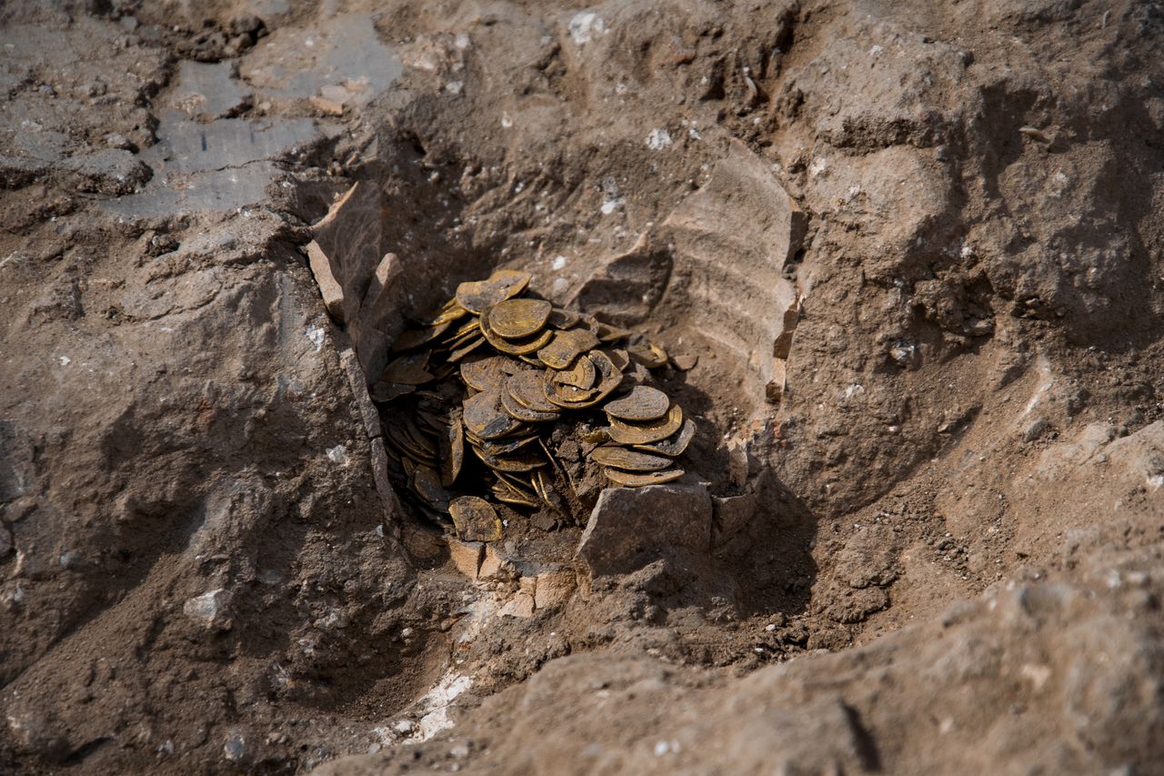 The remnants of the jar that held the coins for about 1,100 years.