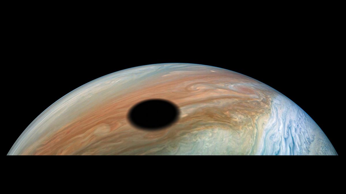 A view of Io's shadow on the surface of Jupiter captured by NASA's Juno probe.