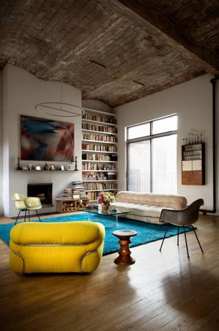 The Living room, featuring two original Eames fibreglass chairs