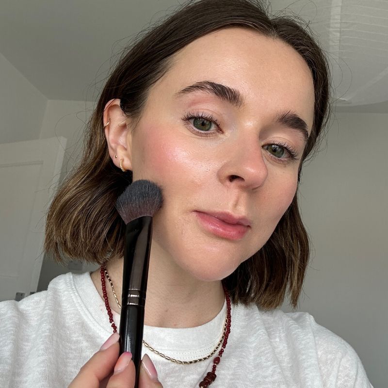 Grace wearing Saie Supersuede Radiant Blush Powder