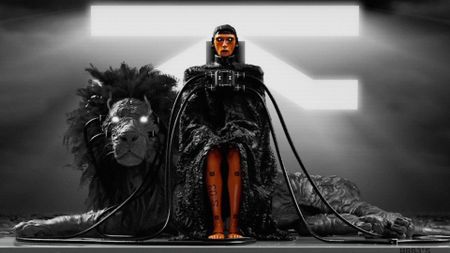 Marathon Introducing Traxus: Art of Traxus' liason sat in a chair with a lion next to them.