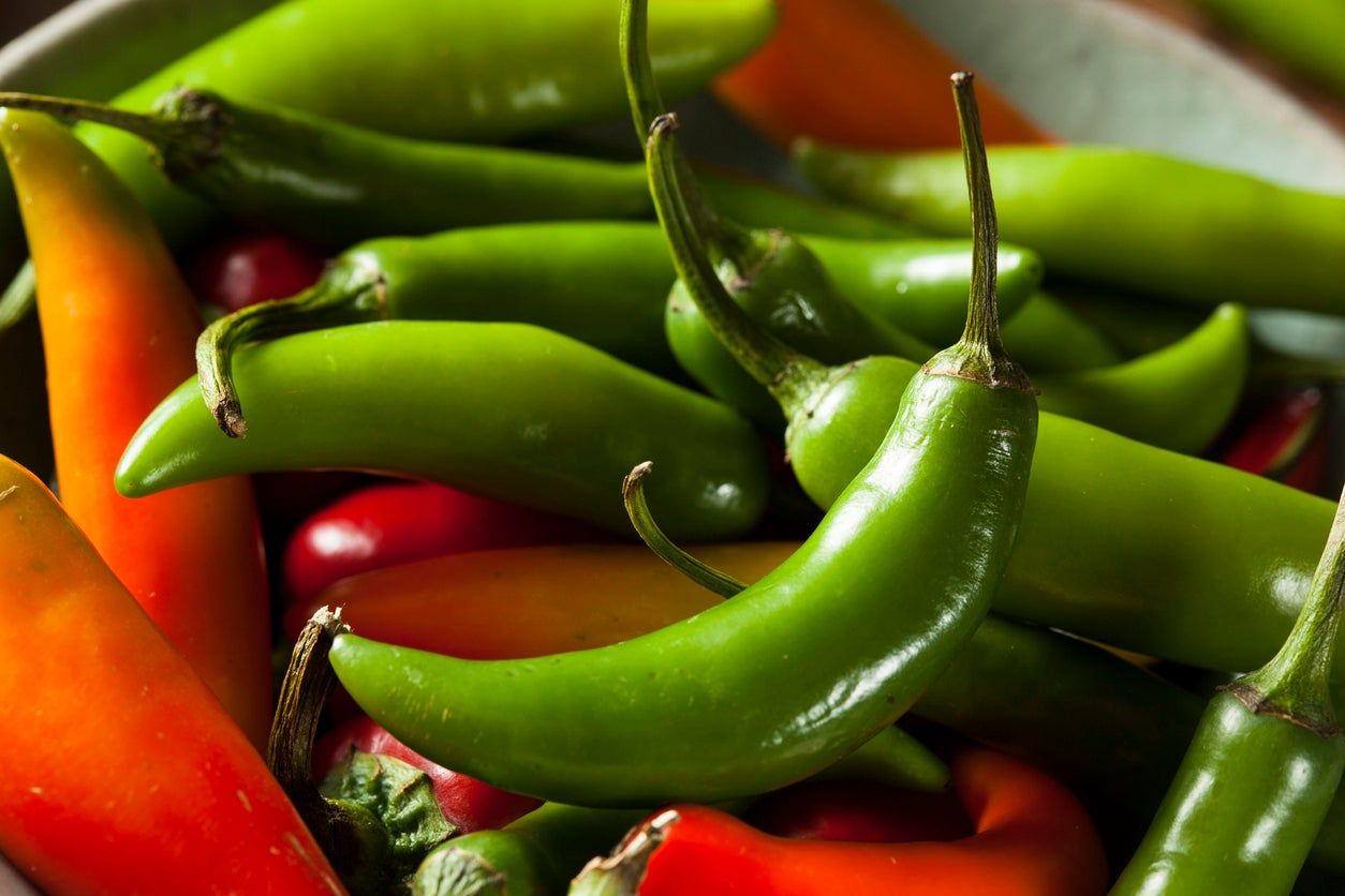 Bowl Full Of Red And Green Serrano Peppers