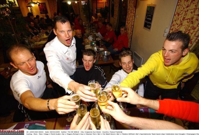 Wilfried Peters raises a toast after Tom Boonen wins a stage in 2005