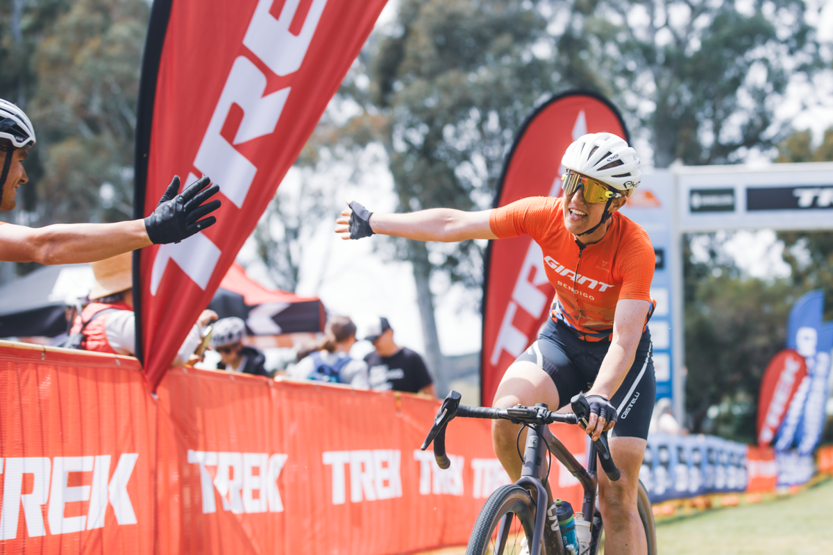 Courtney Sherwell claims the elite women's victory at the Gravelista round of the UCI Gravel World Series race in Beechworth in 2023