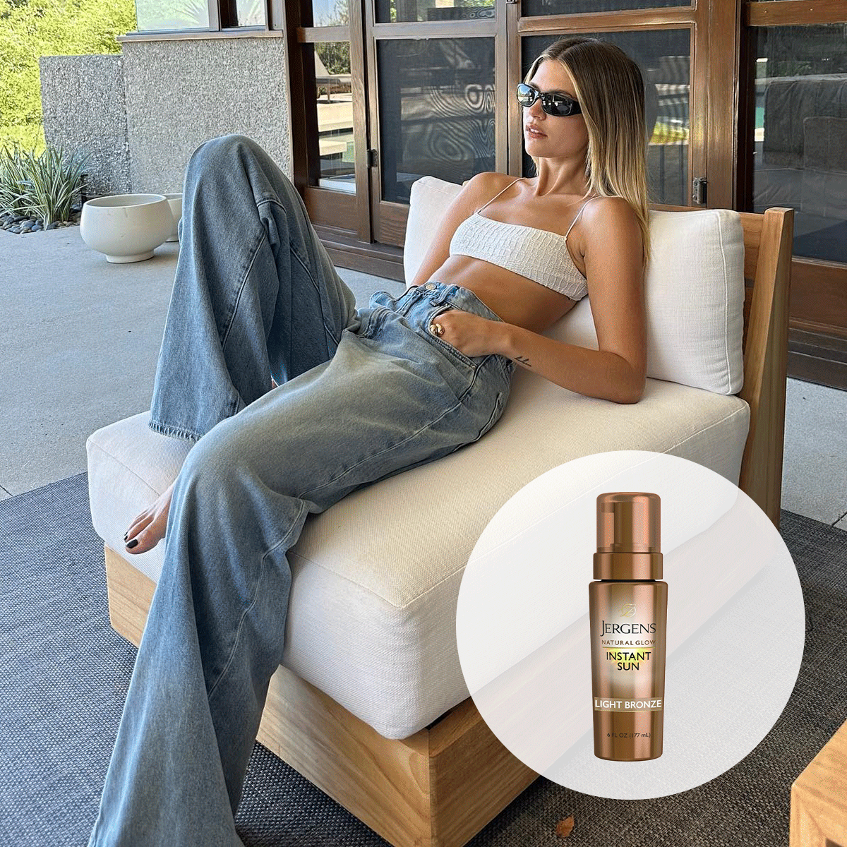 Woman with tanned skin reclining on a lounge chair