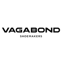 A model's legs with feet in the air, wearing strappy heeled sandals from Vagabond