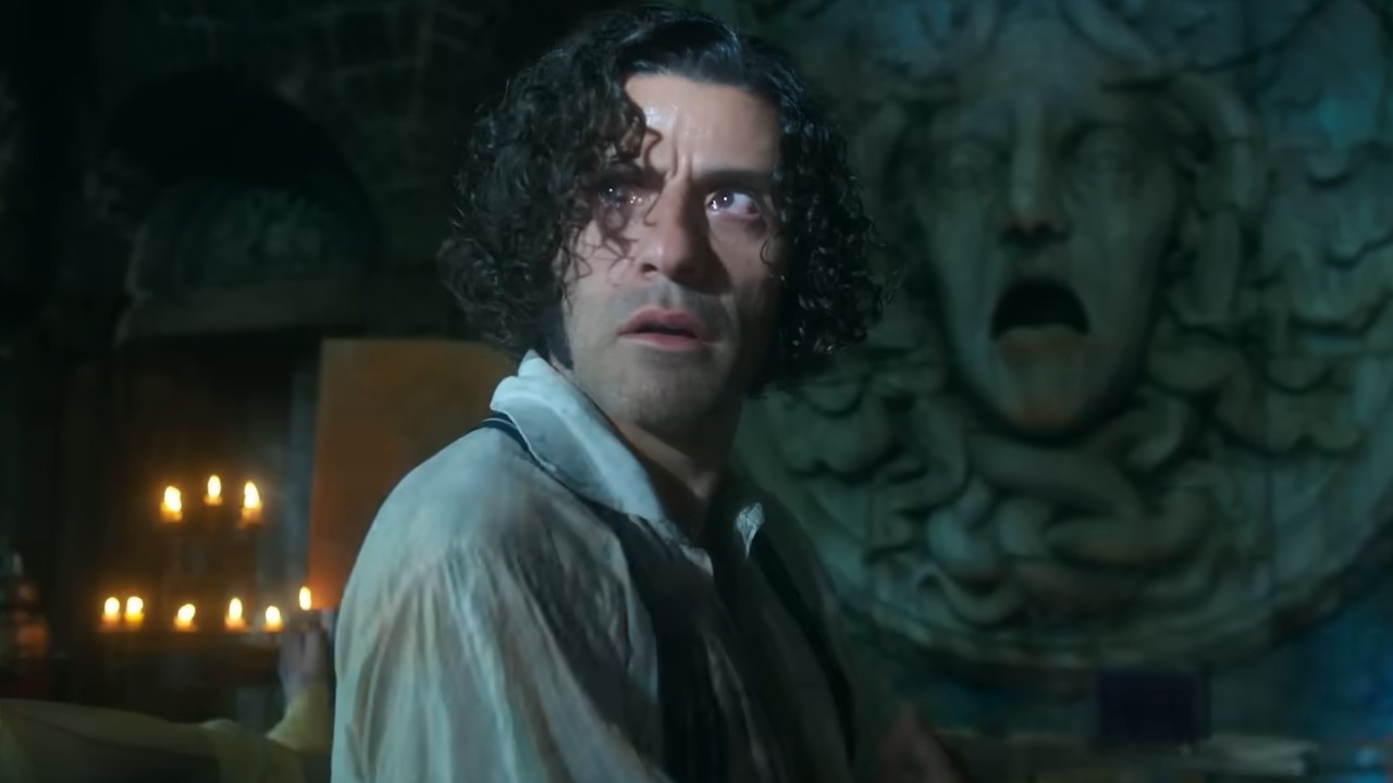 Oscar Isaac with a stunned look on his face in Frankenstein