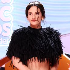 Rosalia attended the Los40 Music Awards in a feather-embellished skirt set from Balenciaga