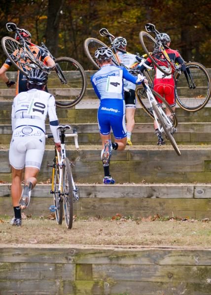 The lead group climbs the amphitheatre.