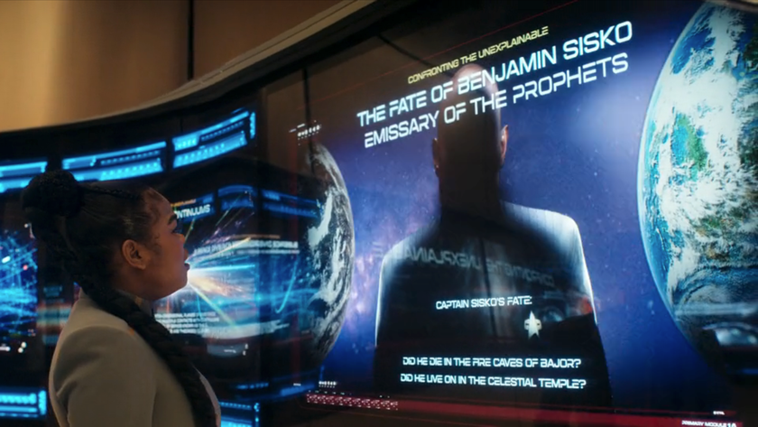 Kerrice Brooks as SAM in season 1, episode 5, of Star Trek: Starfleet Academy looking at a display showing an outline of Benjamin Sisko.