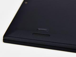 One of two bottom-front speakers on the ThinkPad X1 Carbon.