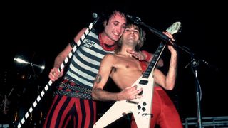American Rock band Quiet Riot performs onstage at Madison Square Garden, New York, New York, October 5, 1983. Pictured are, from left, vocalist Kevin Dubrow (1955 - 2007) and guitarist Carlos Cavazo.
