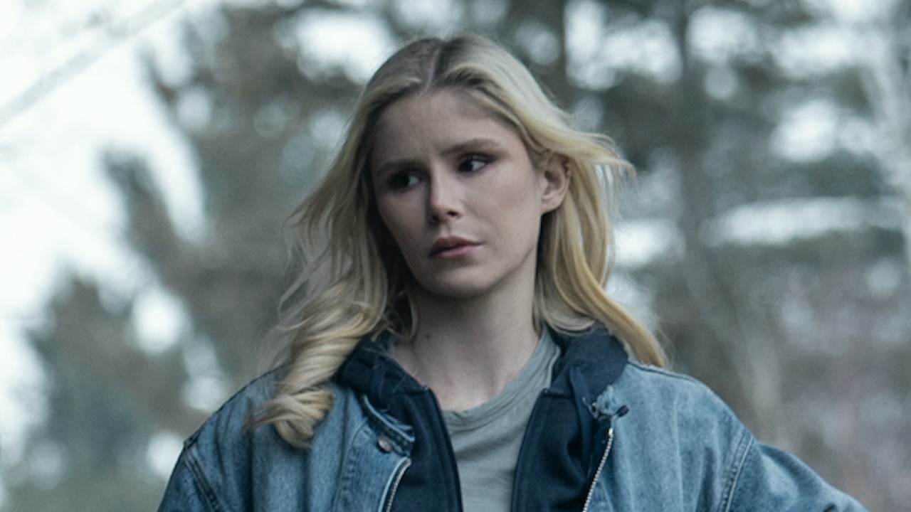 Annie standing outside camp bunk cabin in The Boys Season 5