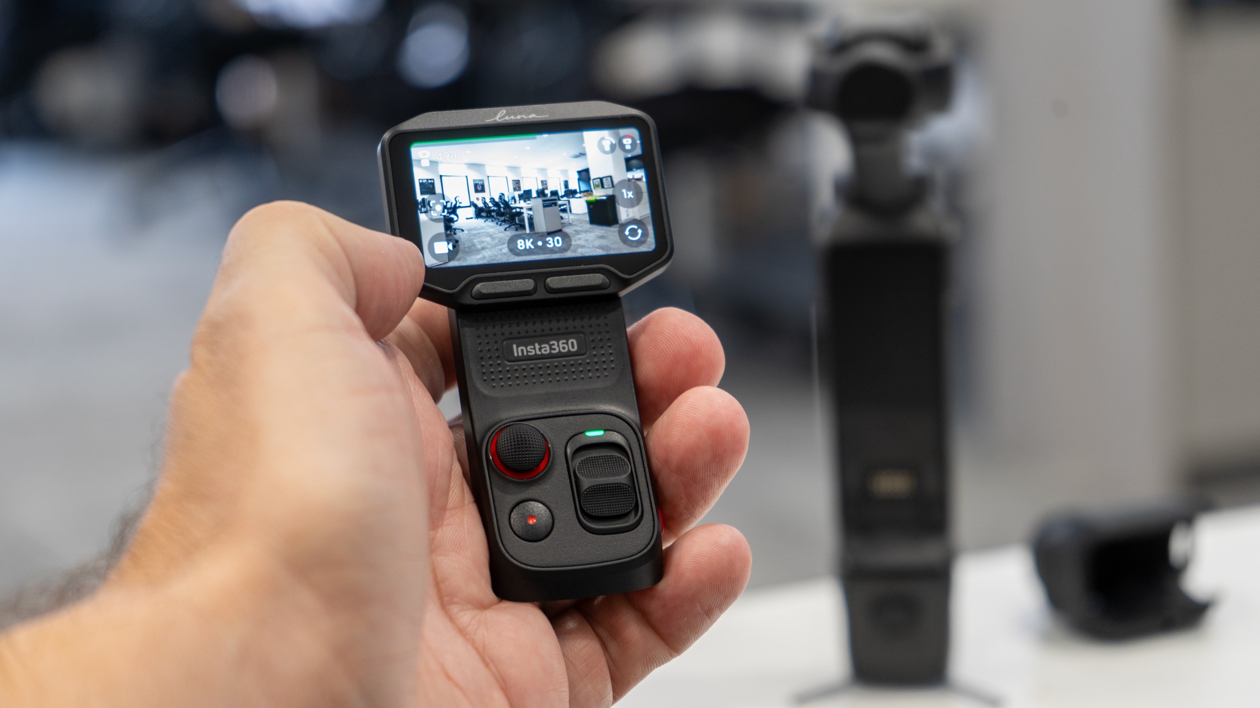Luna Pro remote in Adam Juniper's hand