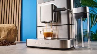 the fully automatic KF8 KitchenAid coffee machine is a stainless steel large coffee machine with a built-in grinder, milk frother, and espresso machine all in one with touchscreen controls