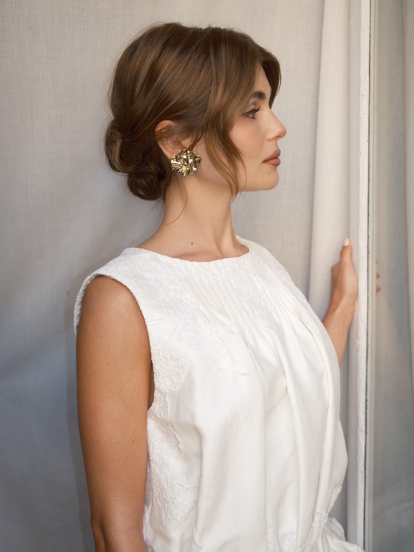 Olvia Jade brown hair with blonde highlights