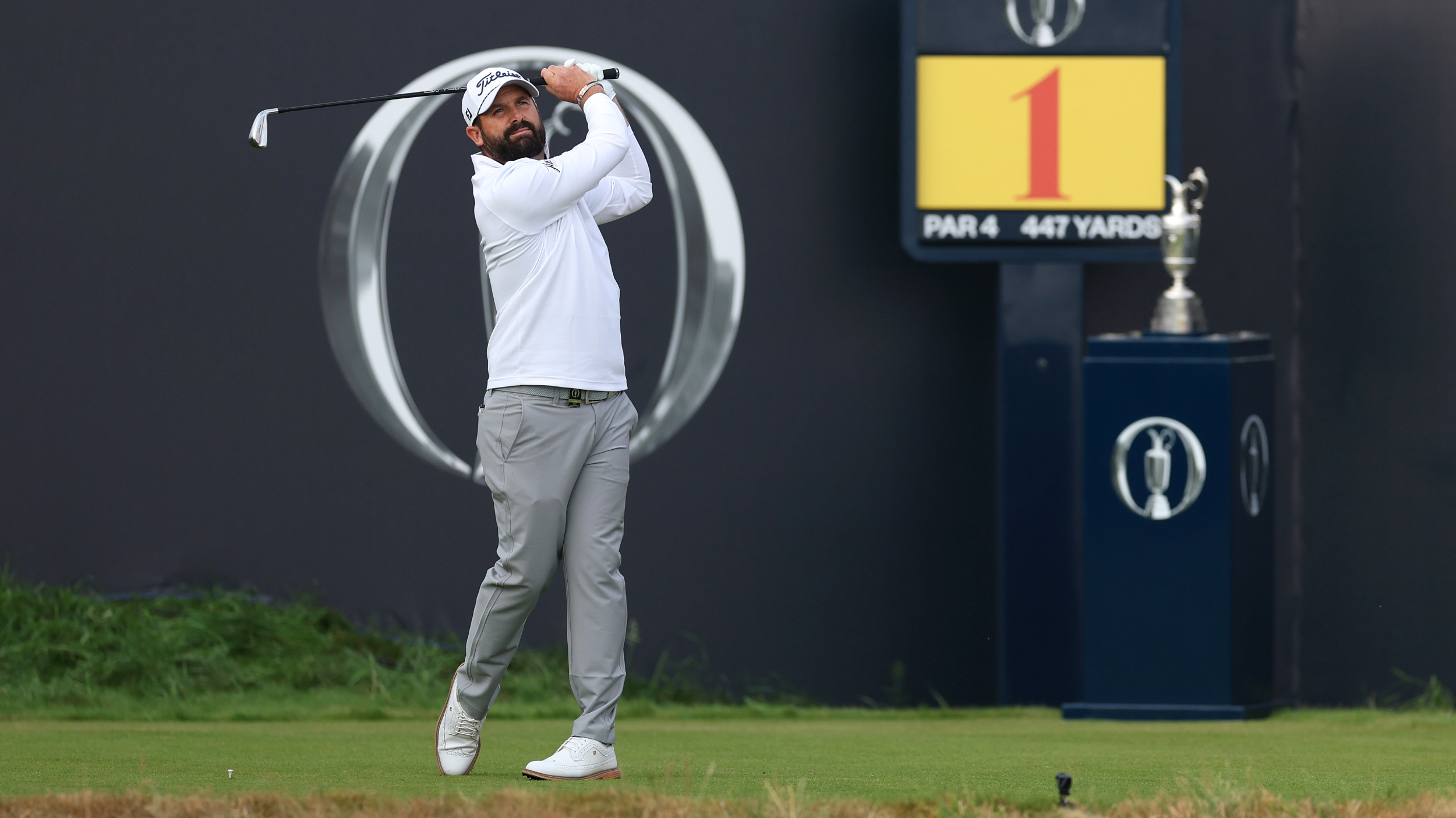 Matthew Baldwin takes a tee shot at The Open