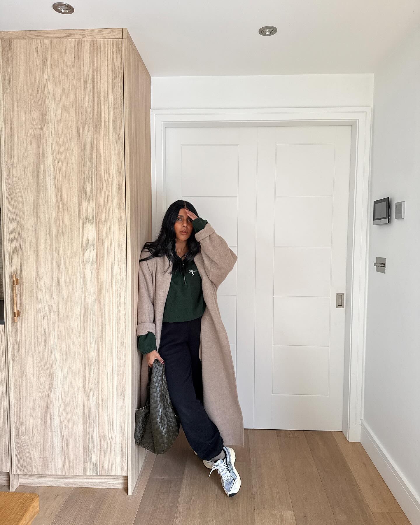 Fashion person Monikh wears colourful trainer outfits.