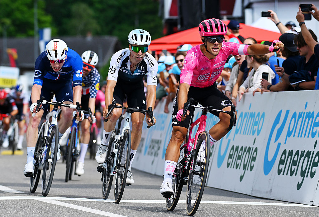 (EDITOR'S NOTE: Alternate crop) Vincenzo Albanese of Italy and Team EF Education - EasyPost (R) celebrates at finish line as stage winner ahead of Fabio Christen of Switzerland and Team Q36.5 Pro Cycling (C) and Lewis Askey of Great Britain and Team Groupama - FDJ (L) during the 88th Tour de Suisse, Stage 2 a 177km stage from Aarau to Schwarzsee / #UCIWT / on June 16, 2025 in Schwarzsee, Switzerland. (Photo by Tim de Waele/Getty Images)
