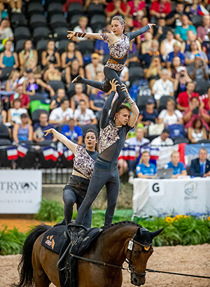 The English Vaulting Squad in action at WEG 2018, with their horse Demezza, lunged by Julie Newell
