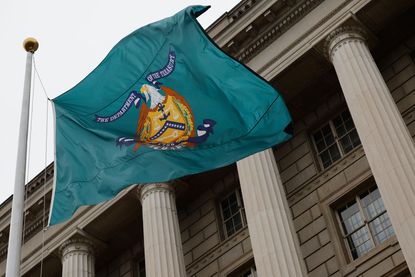 A flag with the seal of the Treasury Department flies outside the headquarters of the Internal Revenue Service